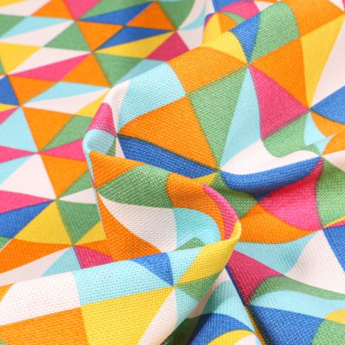 Tissu Toile de Coton Triangles multicolores sur fond Orange