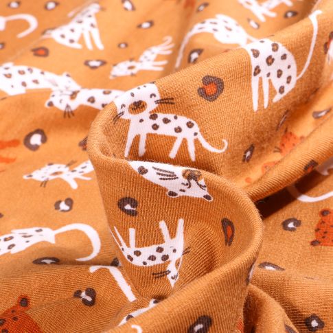 Tissu Jersey coton Bio Baby panthère sur fond Brique