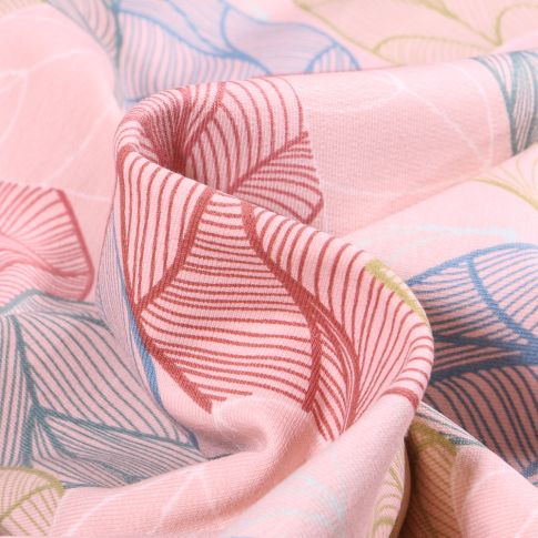 Tissu Sweat léger envers gratté Bio Grandes feuilles géométriques colorées sur fond Rose pâle