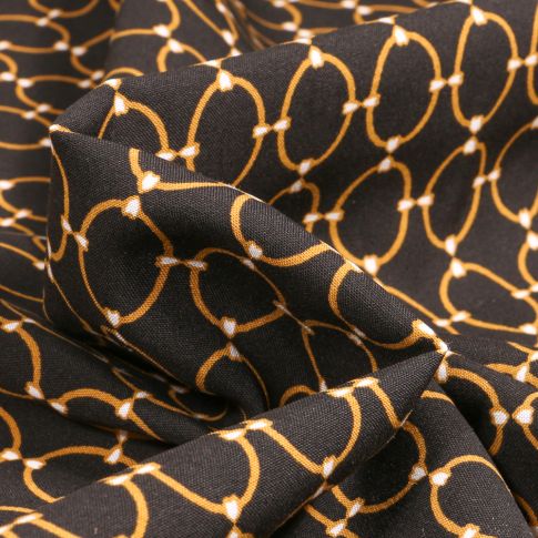 Tissu Viscose Arty Anneaux Or sur fond Noir