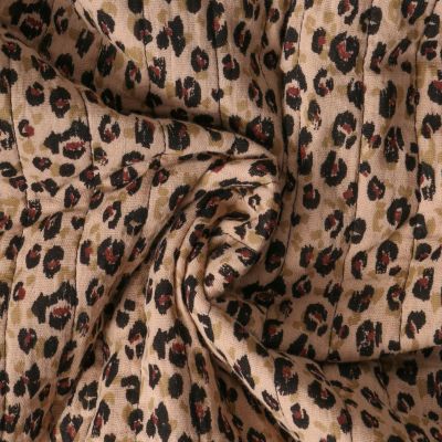 Tissu Double gaze Matelassé réversible  Karlia léopard sur fond Beige nougat - Par 10 cm