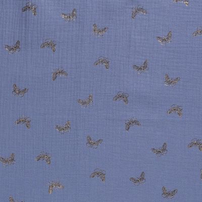 Tissu Double gaze de coton Papillons métallisé doré sur fond Bleu denim - Par 10 cm