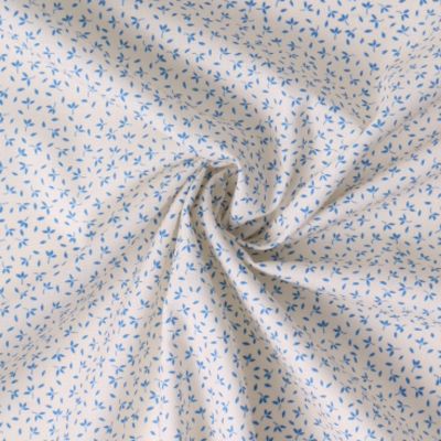 Tissu Coton imprimé Fleuris Tia bleues sur fond Blanc - Par 10 cm