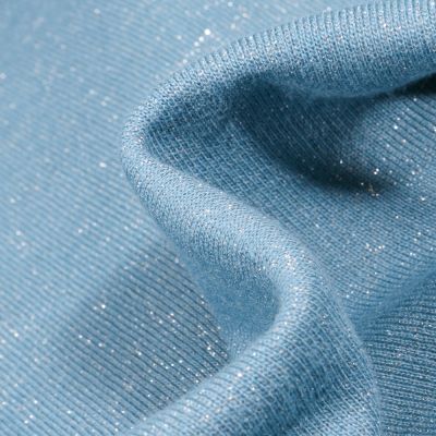 Tissu Sweat uni Pailleté sur fond Bleu - Par 10 cm