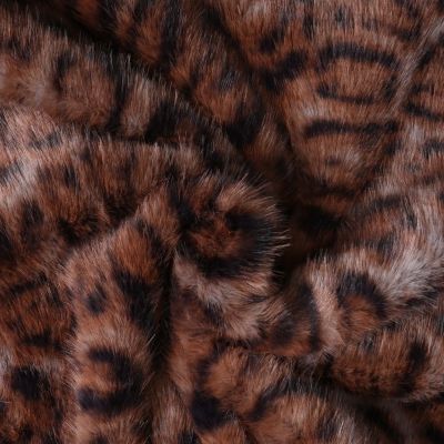 Tissu Fausse fourrure Léna motif panthère Noir sur fond Marron chocolat - Par 10 cm