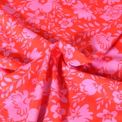 Tissu Jersey Coton Poppy Fleurs rose sur fond Rouge - Par 10 cm