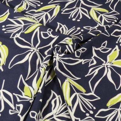 Tissu Stretch imprimé Motifs floraux blanc et vert sur fond Bleu marine - Par 10 cm
