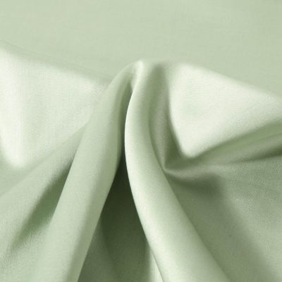 Tissu Satin de Coton uni Vert amande - Par 10 cm