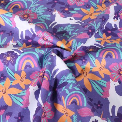 Tissu Popeline de Coton Poppy Licorne sur fond Parme - Par 10 cm
