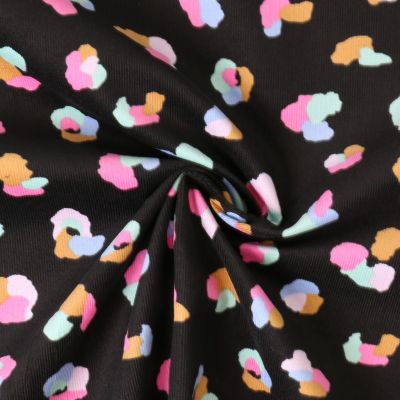 Tissu Velours milleraies Mila motif léopard multicolore sur fond Noir profond - Par 10 cm