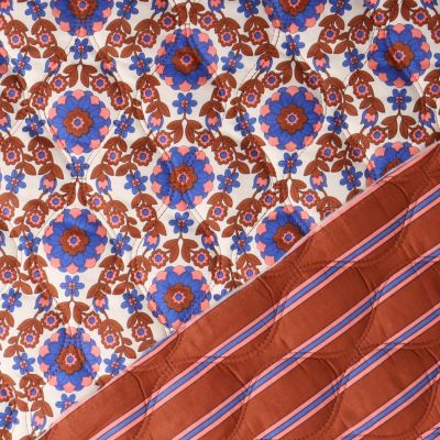 Tissu Matelassé réversible Lila fleurs Bleues sur fond Blanc - Par 10 cm