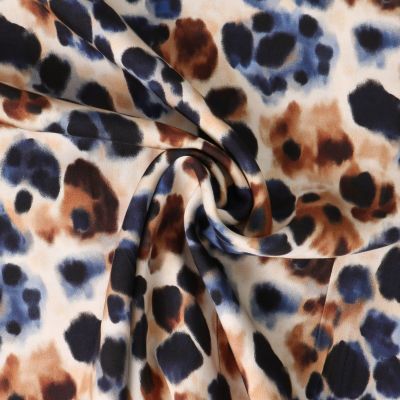 Tissu Viscose Inès motif façon léopard Camel sur fond Beige sable - Par 10 cm