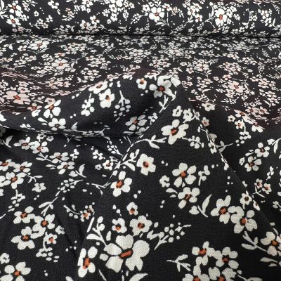 Tissu Viscose Hio sur fond Noir - Par 10 cm