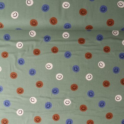 Tissu Flanelle de Coton Zoé smiley Bleu sur fond Vert olive - Par 10 cm