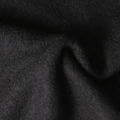 Tissu Laine Bouillie  uni Hanna sur fond Noir - Par 10 cm