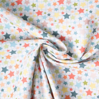 Tissu Coton imprimé Multi stars sur fond Blanc - Par 10 cm
