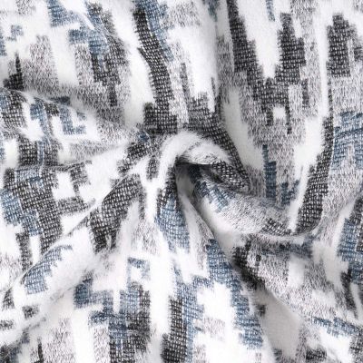 Tissu Maille ethnique duveteux  Bleu sur fond Blanc - Par 10 cm