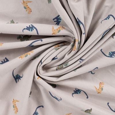 Tissu Jersey Coton imprimé Noé gentils dinosaures sur fond Beige - Par 10 cm