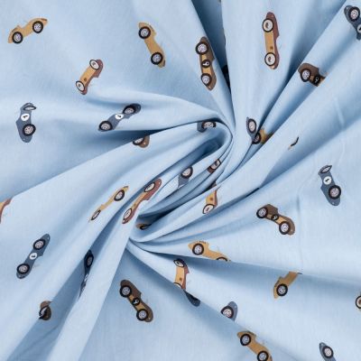 Tissu Jersey Coton imprimé Côme voitures de course sur fond Bleu ciel - Par 10 cm