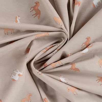 Tissu Jersey Coton imprimé Sacha petits chevaux sur fond Beige - Par 10 cm