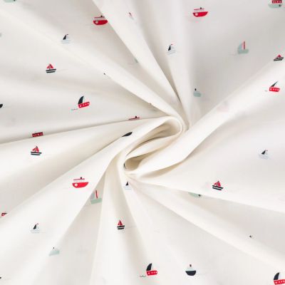 Tissu Coton imprimé Bateaux sur fond Blanc cassé - Par 10 cm