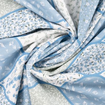 Tissu Popeline de Coton Camille patchwork végétal sur fond Bleu ciel - Par 10 cm