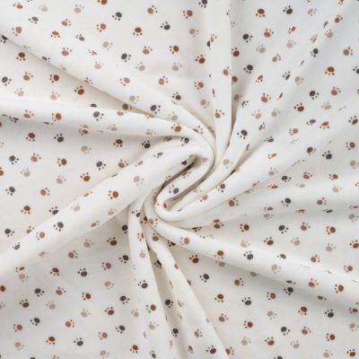 Tissu Jersey Velours tout doux Pattes de chien taupes et grises sur fond Blanc cassé - Par 10 cm