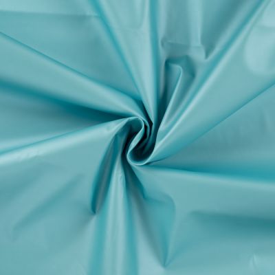 Tissu Imperméable métallisé uni Bleu ciel - Par 10 cm