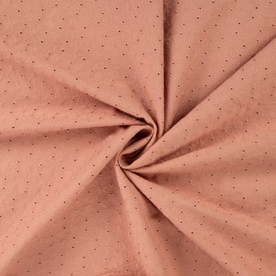 Tissu Coton brodé ajouré Fleuris sur fond Rose nude - Par 10 cm
