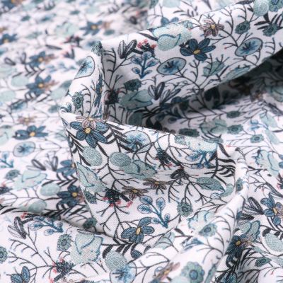 Tissu Popeline de coton Sweet Flower Apolline vert d&#039;eau sur fond Blanc - Par 10 cm