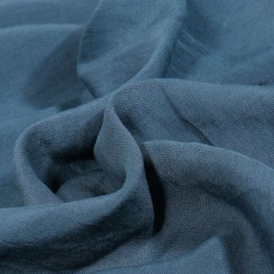 Tissu Viscose Lin Uni Lino sur fond Bleu denim - Par 10 cm