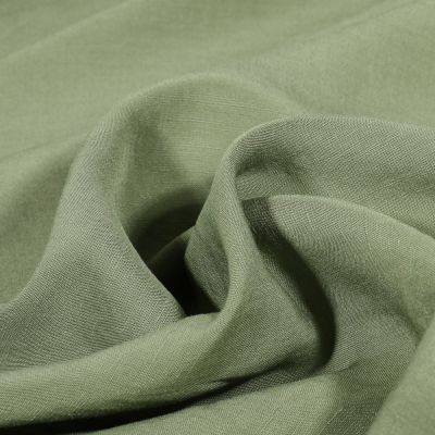 Tissu Viscose Lin Uni Lino sur fond Vert kaki - Par 10 cm