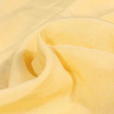Tissu Viscose Lin Uni Lino sur fond Jaune pastel - Par 10 cm