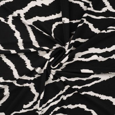 Tissu Jersey Viscose imprimé Motifs blancs sur fond Noir - Par 10 cm