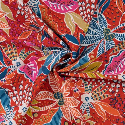 Tissu Viscose extensible Floral exotique sur fond Rouge - Par 10 cm