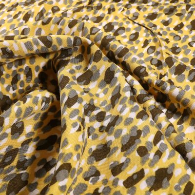 Tissu Viscose légère Tacheté sur fond Jaune - Par 10 cm