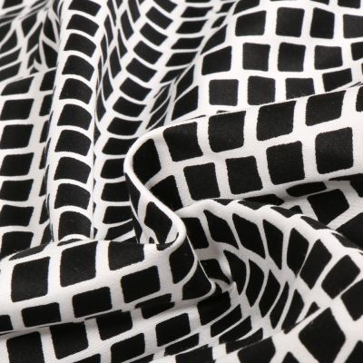 Tissu Coton Satiné extensible Alvé sur fond Noir - Par 10 cm
