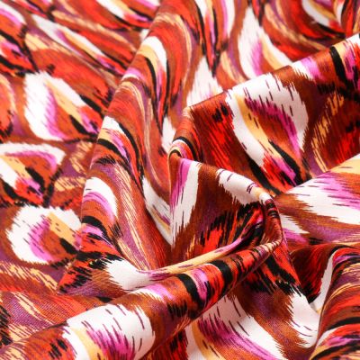 Tissu Coton Satiné extensible Vera sur fond Brique - Par 10 cm
