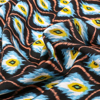 Tissu Voile de Viscose et Coton Ethny bleu ciel sur fond Noir - Par 10 cm