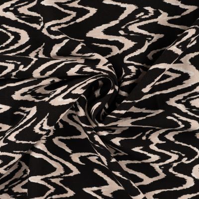 Tissu Viscose aspect Lin Waves beige sur fond Noir - Par 10 cm