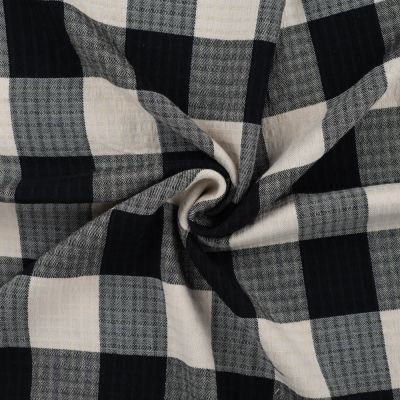 Tissu Polyviscose légèrement gaufré à carreaux noirs sur fond Beige - Par 10 cm