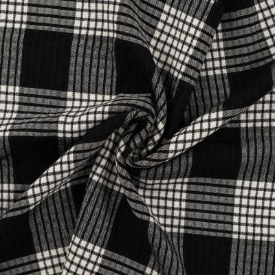 Tissu Polyviscose légèrement gaufré à carreaux noirs sur fond Blanc - Par 10 cm