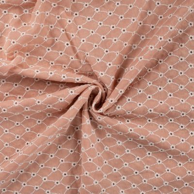 Tissu Gaze de Coton motifs brodés sur fond Saumon - Par 10 cm