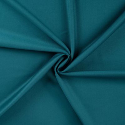 Tissu Gabardine Allegra légère extensible uni  Bleu canard - Par 10 cm