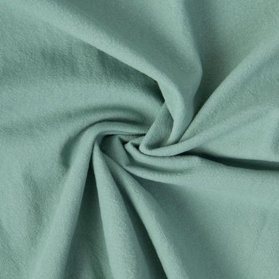 Tissu Coton Lavé aspect Lin uni Vert jade - Par 10 cm
