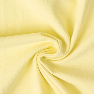 Tissu Coton Lavé aspect Lin uni Jaune - Par 10 cm