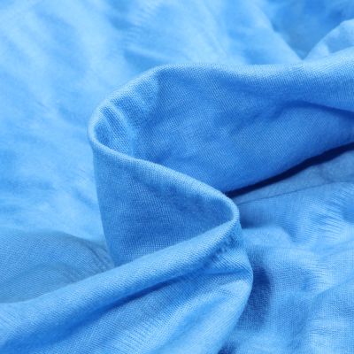 Tissu Jersey Coton smocké uni Bleu turquoise - Par 10 cm