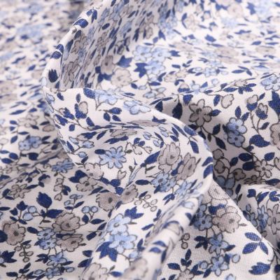 Tissu Coton imprimé Arty Léonie bleu et gris sur fond Blanc - Par 10 cm