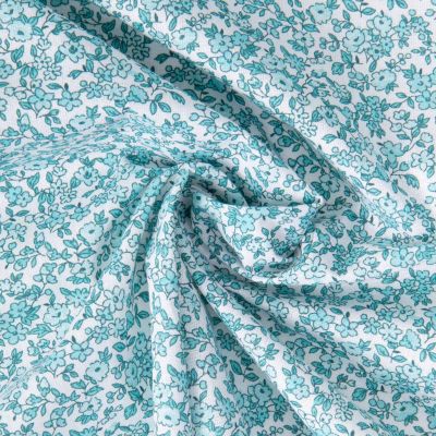 Tissu Coton imprimé Arty Léonie Menthe et bleu sur fond Blanc - Par 10 cm