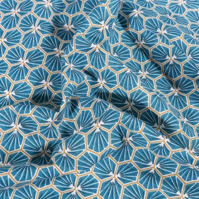 Tissu Coton imprimé Arty Riad sur fond Bleu pétrole - Par 10 cm